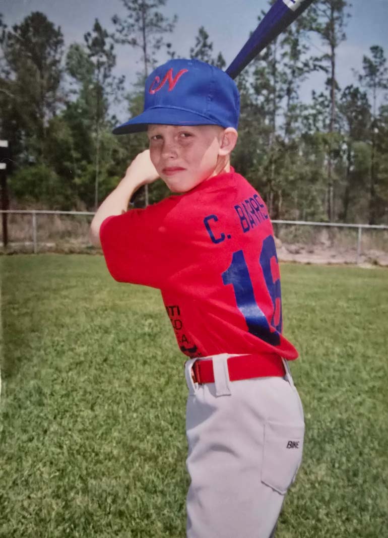 Young Cody Barrs Baseball Player in Red